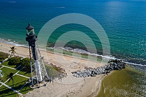 Hillsboro Lighthouse aerial image Atlantic Ocean waves on the shore