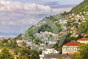 A hillside of homes and businesses that make up the Norwegian city of Bergen