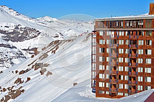 Hotel on snowy mountainside photo