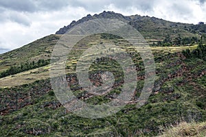 Hillside tombs at the biggest cemetery from Incan time, Pisac Inca Ruins in the Sacred Valley of the Incas, Cusco, Peru