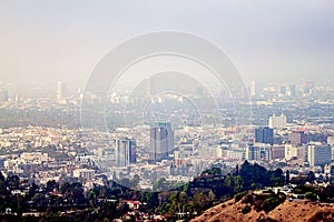 Hillside view of Burbank and Wilshire buildings in haze photo