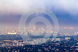 Hillside view of Burbank and Wilshire buildings in haze photo