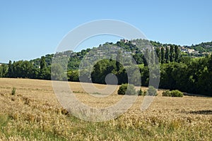 Hilltop Penne d`Agenais and its Notre Dame de Peyragude basilica