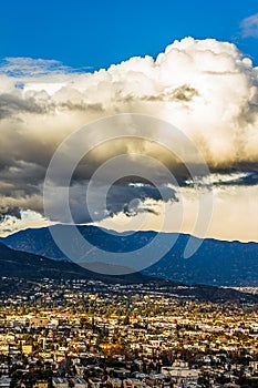 Hilltop view of burbank and san fernando valley, san gabriel mountains with cloudscape photo