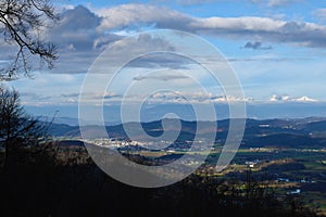 Hilly landscape around the town of Grosuplje in Dolenjska, Slovenia photo