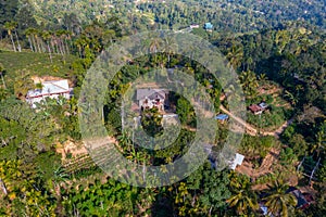 Hilly landscape of Sri Lanka dotted with villages and tea planta