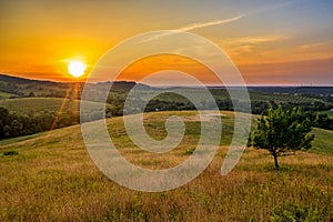 Hilly landscape on sunset time