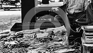 Hilsa rohu katla lobster prawn and various types of fishes displayed in indian fish market at Kolkata in black and white