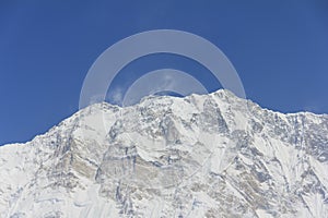 Himalaya Annapurna One, snow mountain peak in blue sky, Nepal
