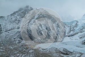 Himalaya mountains Everest Base Camp on stormy weather in the fog and clouds