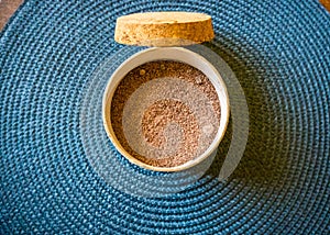 Himalayan black salt, Indian black salt or Kala namak on wooden table.