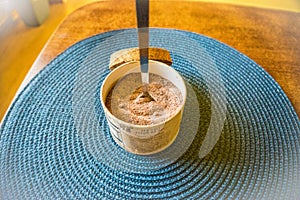 Himalayan black salt, Indian black salt or Kala namak on wooden table.