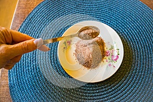 Himalayan black salt, Indian black salt or Kala namak on wooden table.