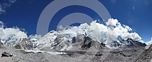 The himalayan Everest Range with blue sky and clouds, seen from the Everest Base Camp trek, Nepal
