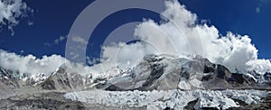 The himalayan Everest Range with blue sky and clouds, seen from the Everest Base Camp trek, Nepal