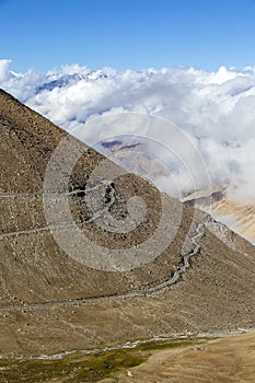 Himalayan landscape in Himalayas mountain along Manali - Leh highway. Himachal Pradesh, Ladakh, India . Big mountains, dirt road,