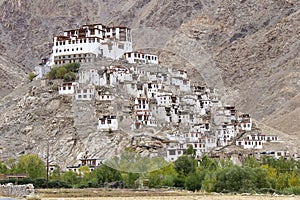 Himalayan mountains and Chemrey gompa, Buddhist monastery in Ladakh, India