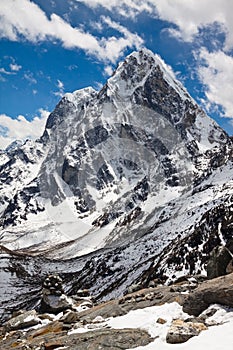 Himalayan mountains Cholatse and Tabuche Peak on a sunny day. Ne