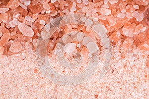 Himalayan pink salt, coarse salt and fine salt, top view, close up