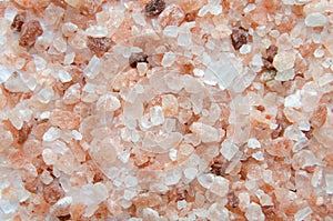 Himalayan pink salt on white background