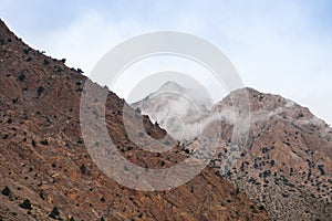 Himalayan rock mountain with mist.