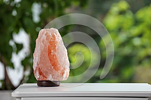 Himalayan salt lamp on table