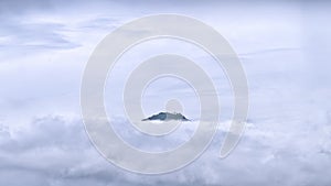Himalayan Solitude: Peak above Clouds