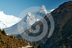 Himalayan trail towards Everest base camp overlooking Ama Dablam mountain.