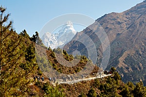 Himalayan trail towards Everest base camp overlooking Ama Dablam mountain.