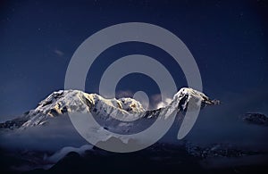 Himalayas snow peak at night sky