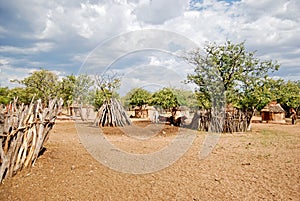 Himba village with traditional huts near Etosha National Park in Namibia