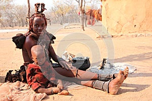 Himba woman and son