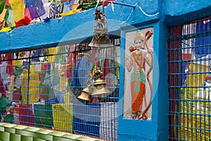 Hindu and buddhist religious symbols, prayer flags and bell