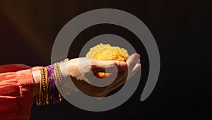 Hindu Ceremonies, Rituals, Spirituality, Religion and Hope Concept. Woman Holdings Marigold Flowers , Respect and Surrender.