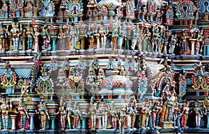 Hindu colorful Gods statues on a gopuram in India