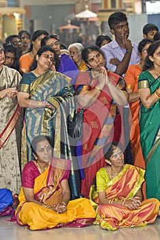 Hindu devotees gather and pray