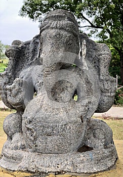 Hindu God deity statue. Ancient sandstone carved historical Hindu God sculptures in the temple walls.