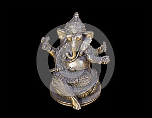 Hindu God Ganesh (Ganesha) Statuette, isolated on a black background