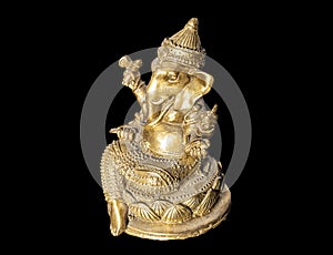 Hindu God Ganesh (Ganesha) Statuette, isolated on a black background