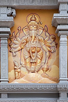 Hindu God Ganesh with Many Arms photo
