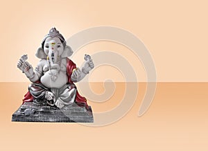 Hindu God Ganesha on Light background, Ganesha Idol. Ganesh festival