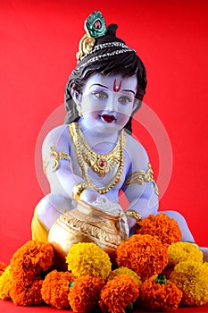 Hindu God Krishna on red background