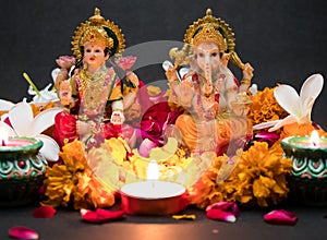 Hindu God Laxmi Ganesh with Candle Light at Diwali Festival