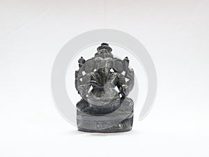 hindu god lord ganesh black rock statue