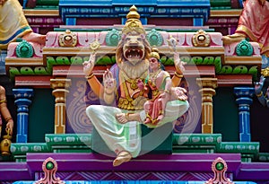 Hindu god lord Vishnu in Narasimha avatar (lion face)