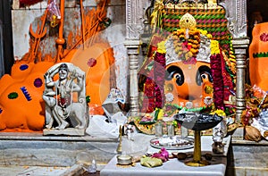 hindu goddess Shri Chamunda Mata statue at ancient temple from different angle photo