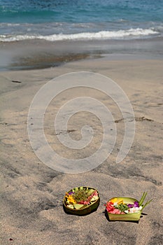 Hindu offerings to the gods on the beach. Cristal Bay. Nusa Penida. Bali province. Indonesia