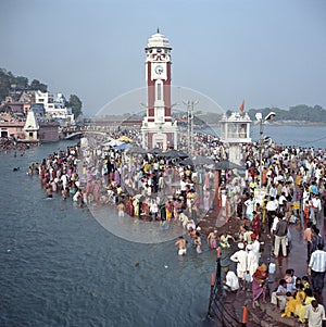 Hindu pilgrims, River Ganges, Haridwar, India photo