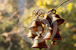 Hindu prayer bells in remote temple in forest
