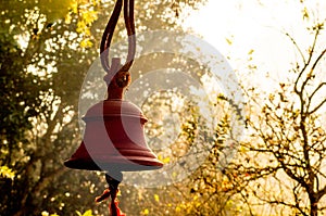 Hindu prayer bells in remote temple in forest